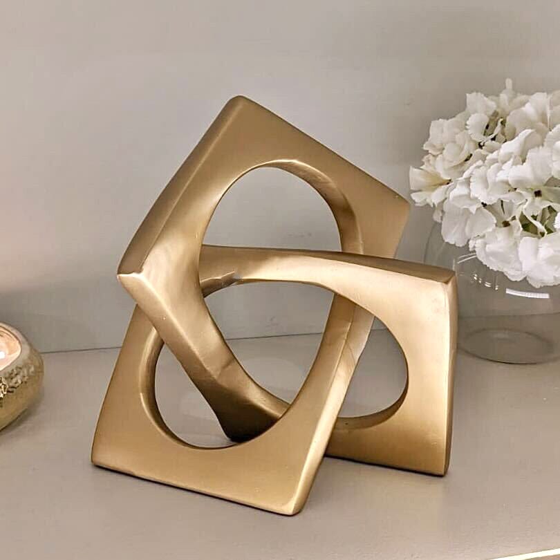 Artistry - Guld Dekorativ Knoop Skulptur för Tidlös Inredning och Elegans